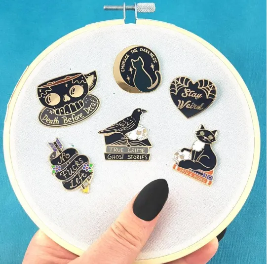 Jubly Umph Lapel Pin  Black Raven Reader
